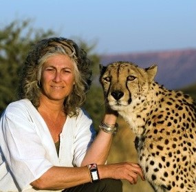 Laurie Marker with a cheetah. Photo by Christophe LePetit.