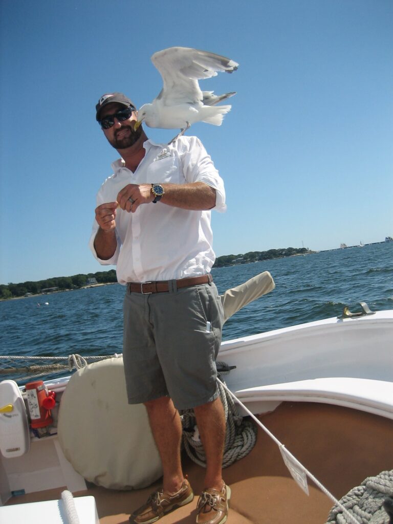 Capt. Ellis and his herring gull friend, Polly.