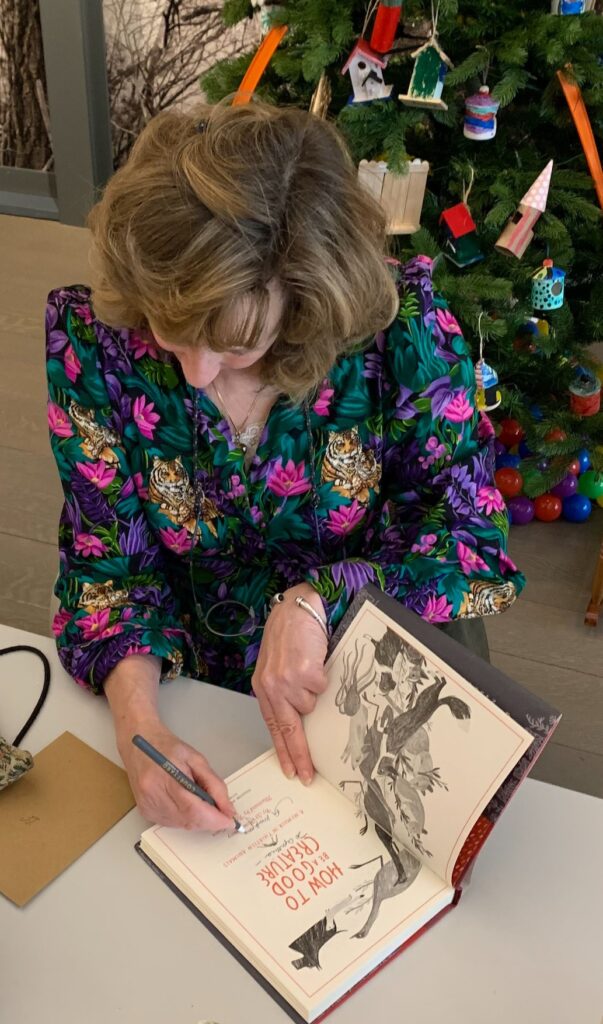 Sy signing books at the annual Family Trees gathering in the Concord Museum